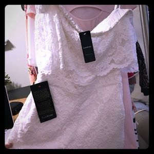 Bebe strapless white lace romper. Size 2